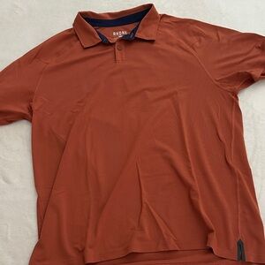 RHONE Men's delta pique Polo Shirt in Rich Rust